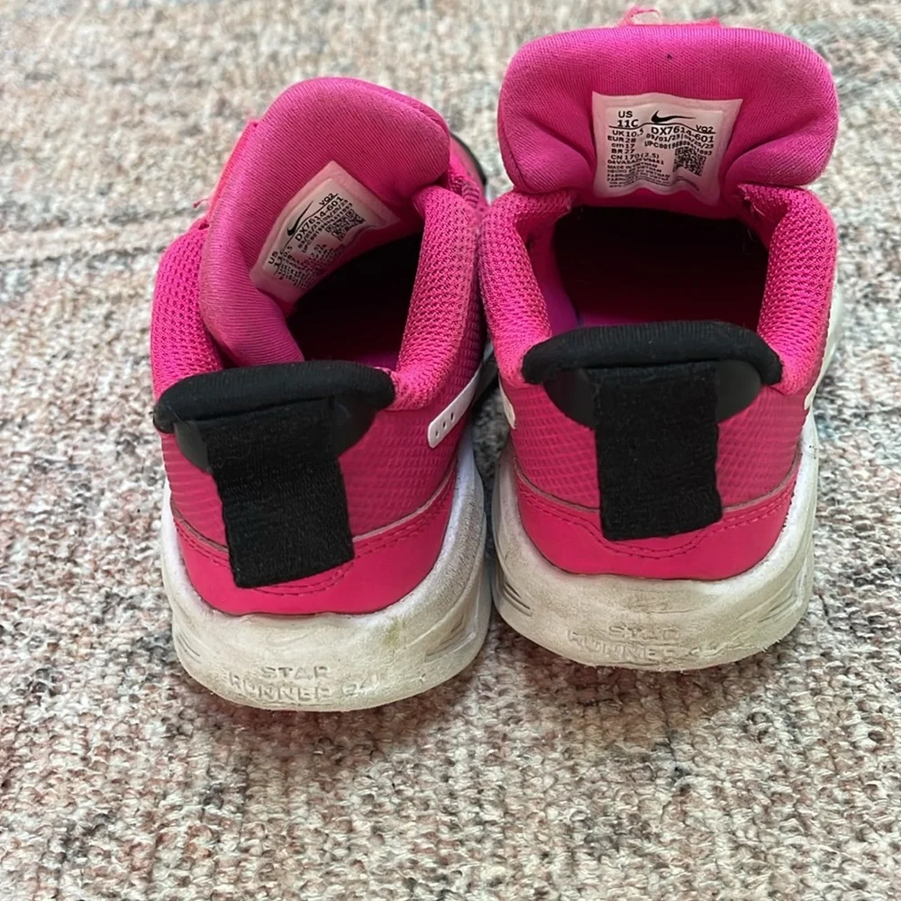 Girls pink Nike sneakers 11c